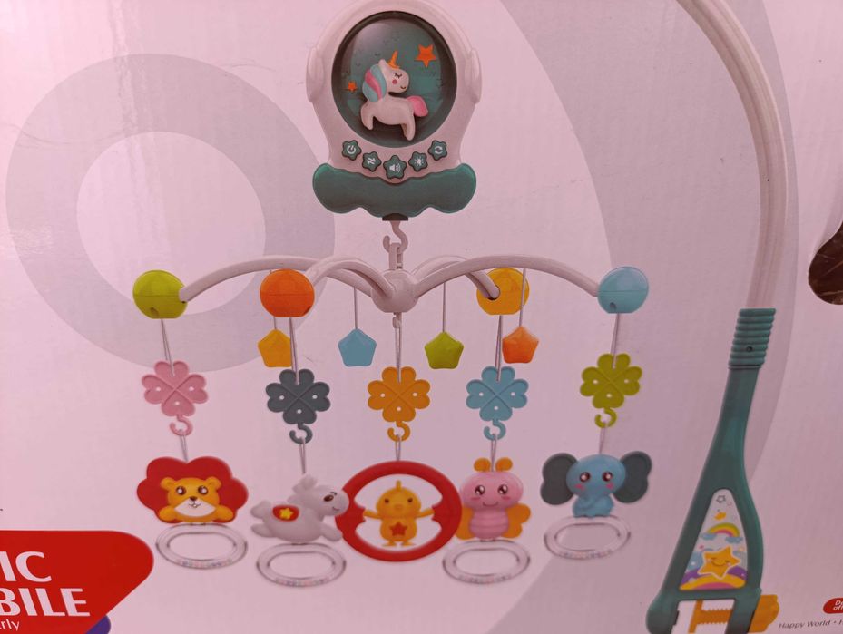 Карусель музична на кроватку