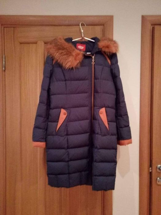 Продам пуховик 46р