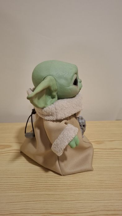 Baby Yoda como novo