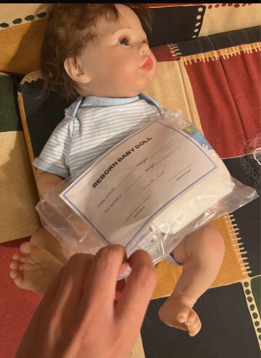 Bebe reborn com roupa, chupeta e biberao