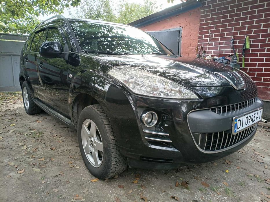 Пежо 4007 позашляховик кросовер.