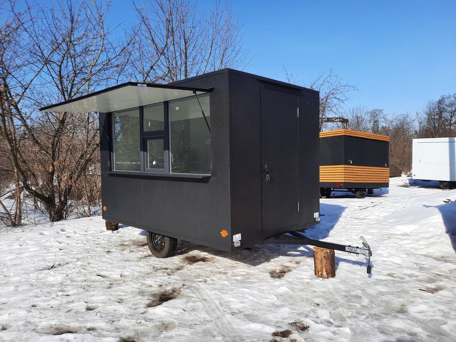 Торговий причіп-кіоск на колесах під каву.