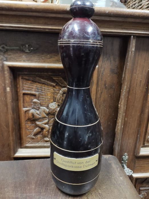 Drewniana skarbonka w kształcie kręgla