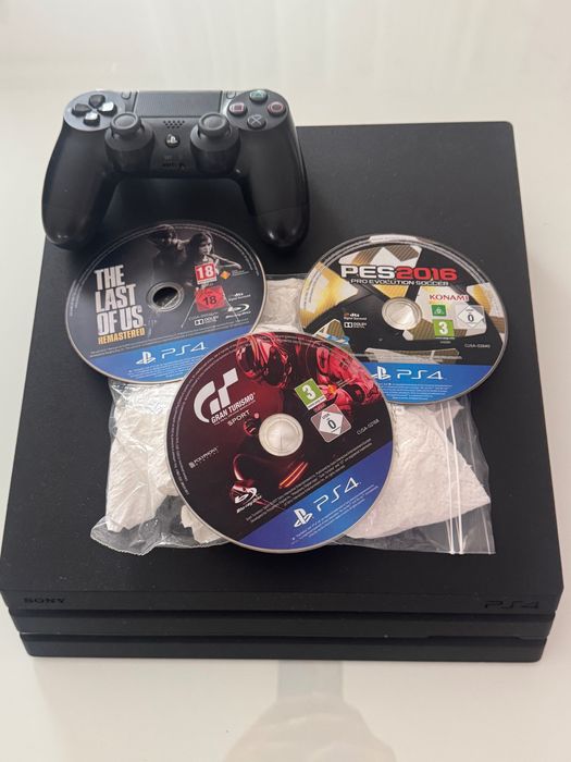 Ps4 pro 1 tb com 1 comando e jogos