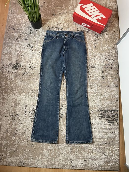 Spodnie jeansowe damskie dzwony wrangler W31L34