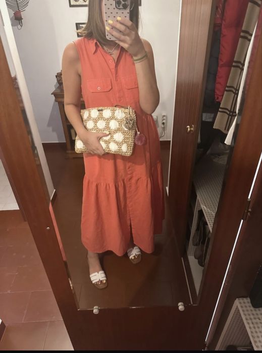 Clutch em ráfia, em bom estado, com pouco uso.