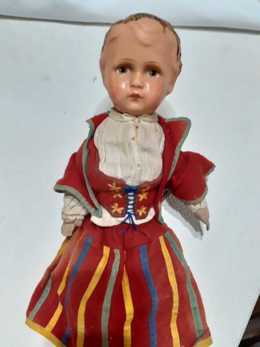Very old papier-mâché doll with traditional attire from the island of Madeira64586357828353122