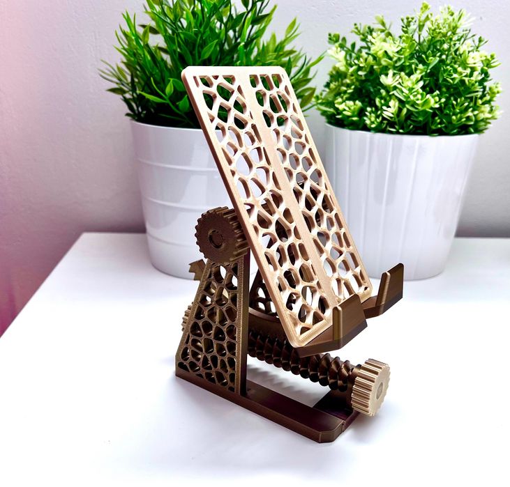 Регульована підставка для телефону