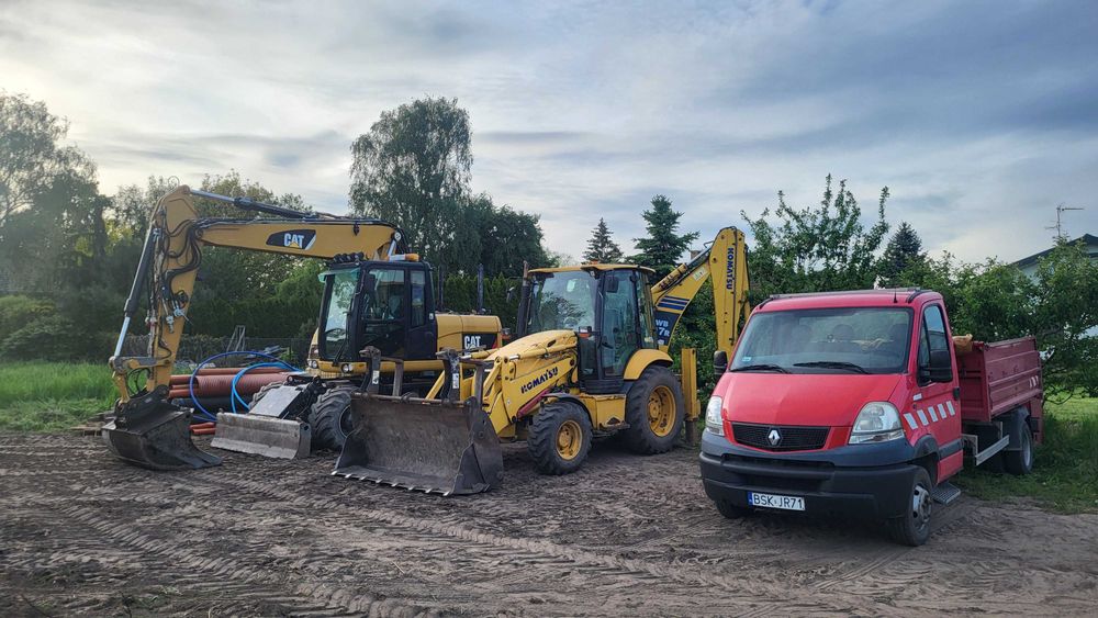 Koparka,koparko-ładowarka,wywrotka,piasek,ziemia,beton,kruszywo