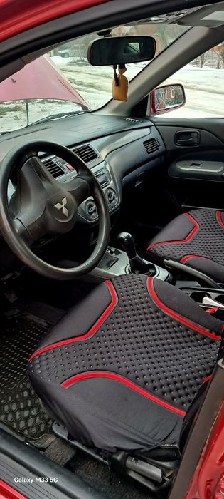 Мицубиси лансер.