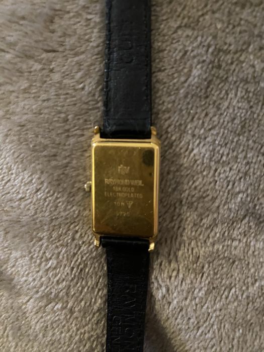 Relogio  de marca  RAYMOND WEIL  de senhora muito delicado, caixa