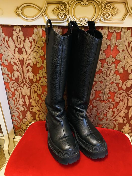 Шкіряні чоботи …….