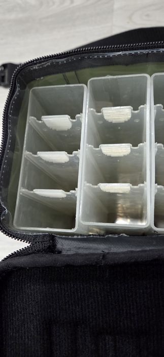 Conjunto mala Rapala e amostras spinning.