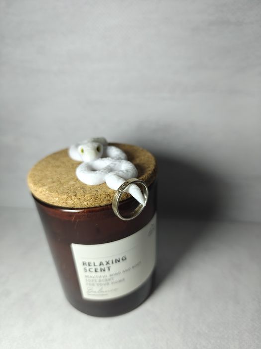 Срібне кільце з золотом 875° та трьома білими фіанітами