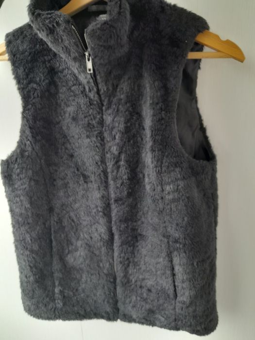 Жилетка, безрукавка