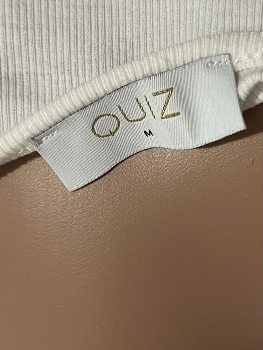 Боді жіноче біле з рюшами