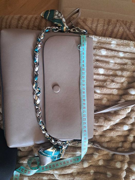 Сумка із шкірозамінника.