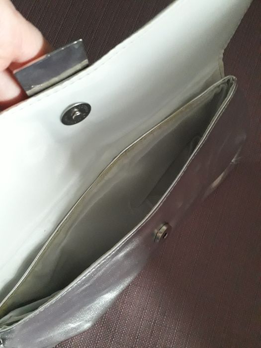 Новая косметичка/сумочка- клатч Ungaro ( Avon)