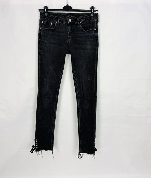 Szare jeansy z przetarciami M 38