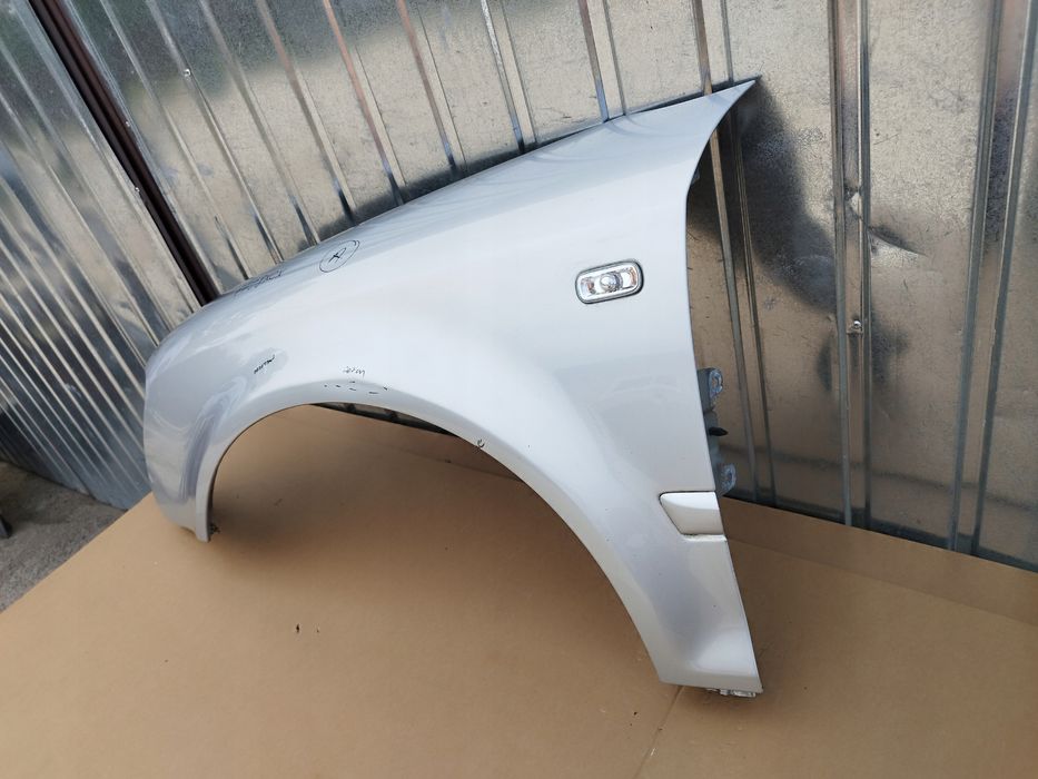 blotnik lewy przod audi a4 b7 cabrio 2004-2008 kolor ly7w