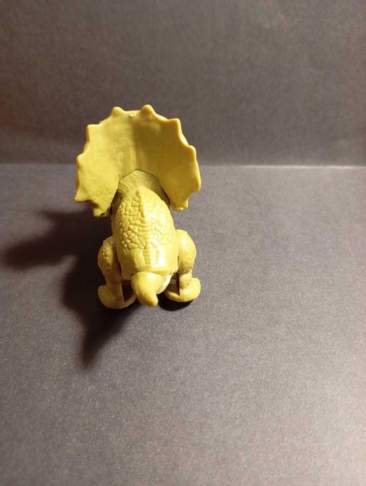 іграшка динозаврин