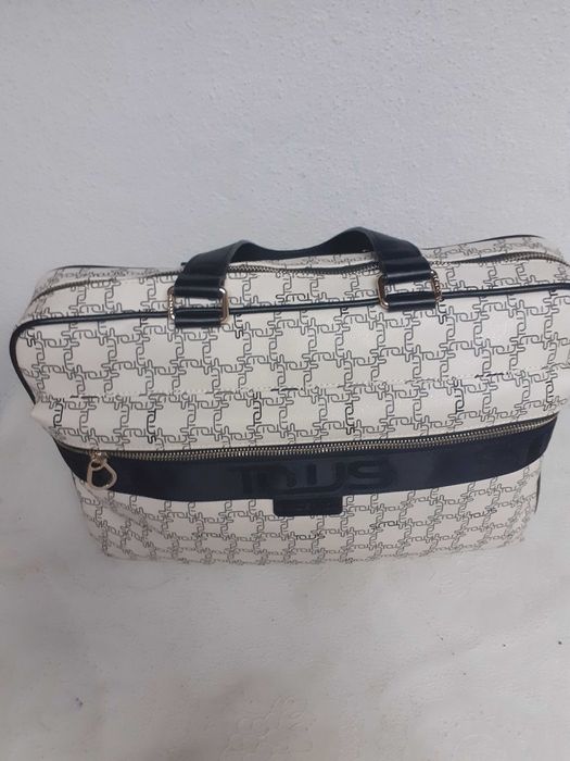 Mala senhora da Tous