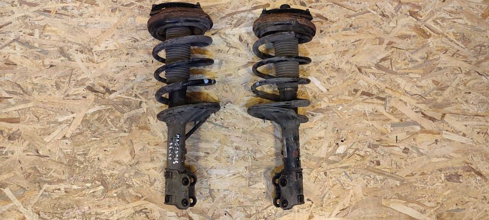 Б/в Стойкі пружини амортизатори передні L R  Kia Magentis 06-08