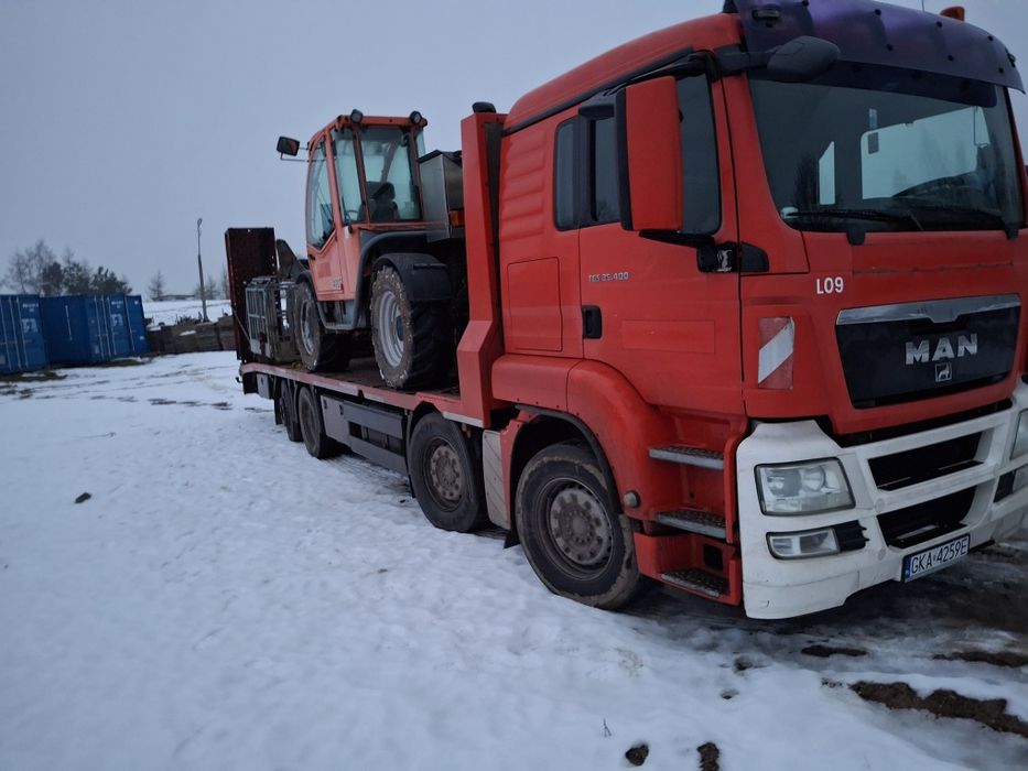 Transport laweta maszyny budowlane wozki widłowe koparki ładowarki