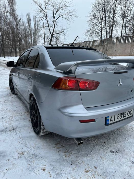 Mitsubishi lancer X автомат кожа на газу
