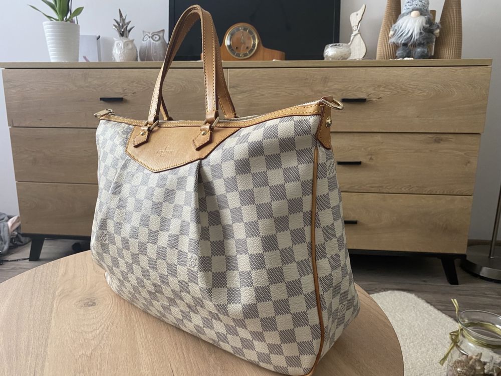 Torebka Louis Vuitton, Tychy