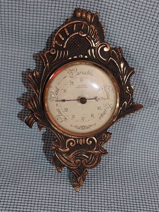 Barómetro antigo em bronze