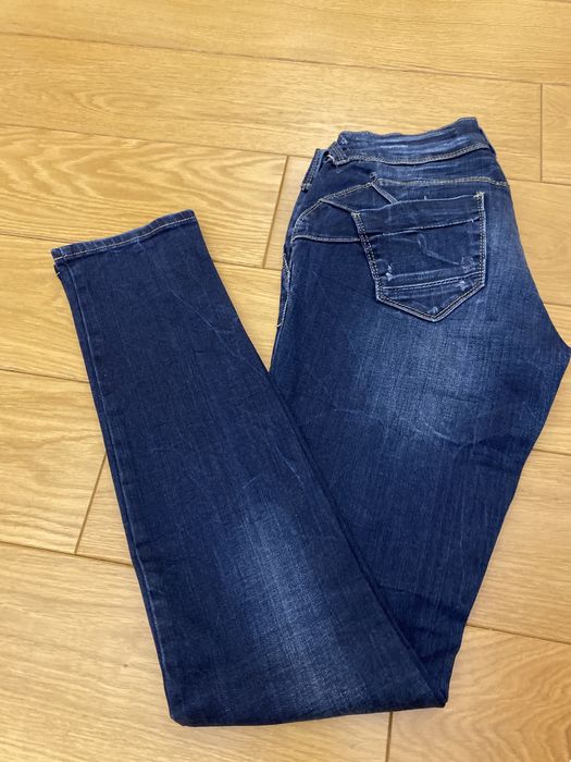 Jeansy 38 granat