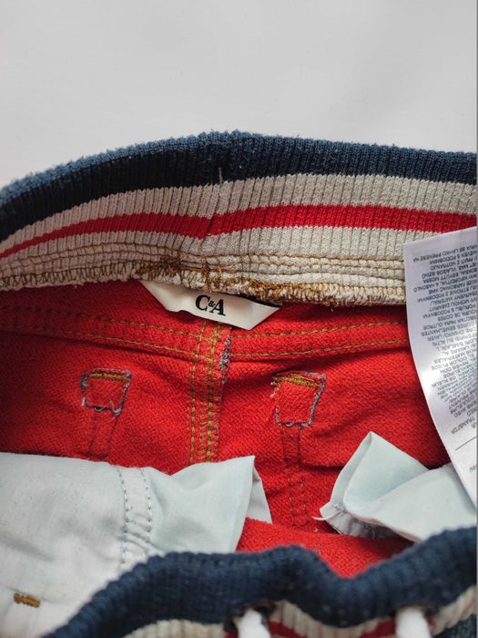 Jeansy niebieskie z meszkiem wiązane C&A r. 110