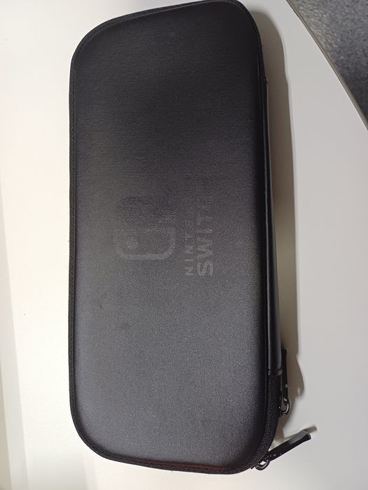 Nintendo + comando extra + bolsa