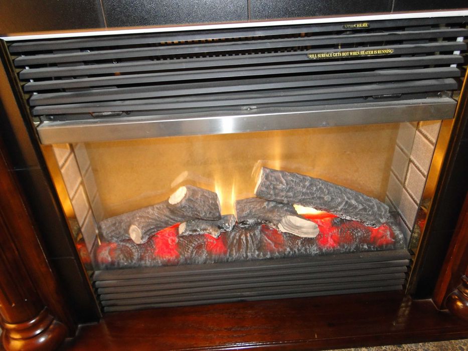 Aquecedor imitando uma lareira - Produz calor ou simplesmente faz o