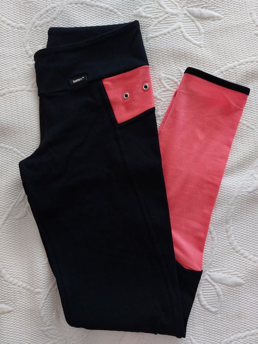 Leggins Botton pretas e laranja florescente