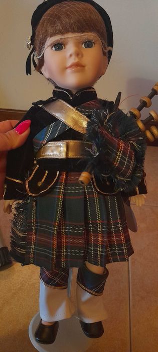 Boneco escocês de porcelana