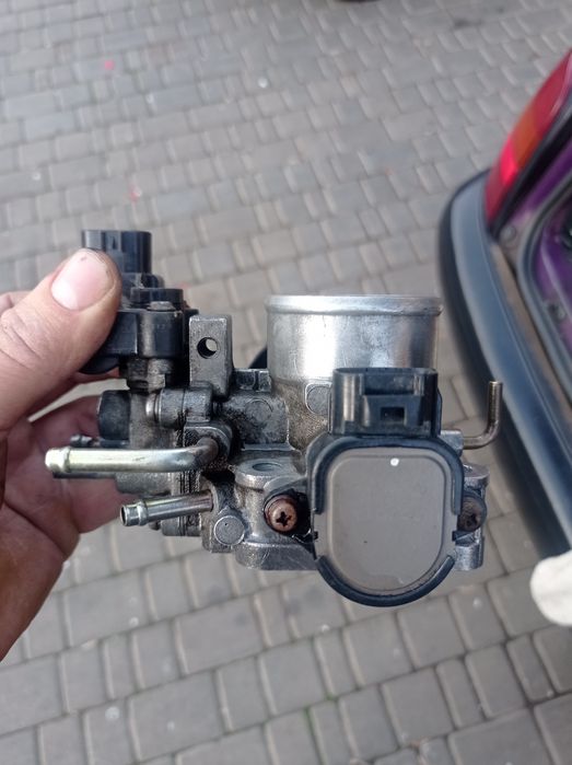 Продам Дроссельную заслонку TOYOTA 4E-FE