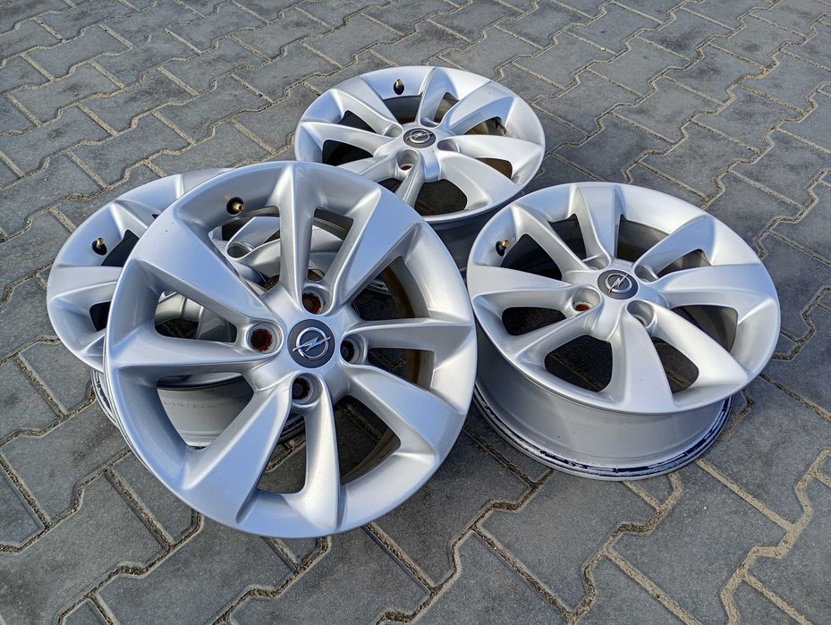 Oryg. Opel 15cali 4x100 ET39 Adam Corsa Meriva Tigra Astra Combo + czujniki TPMS