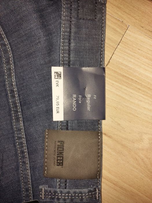 Nowe spodnie jeansowe  rozm.35/34