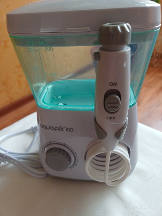 Професійний іригатор AquapiK 100(600мл, 10 режимів)