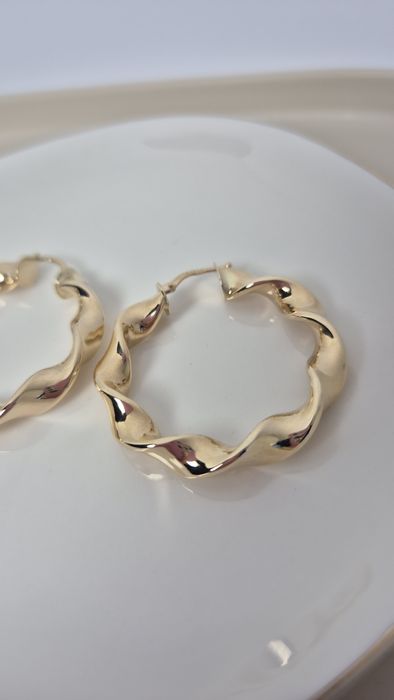 Nowe złote kolczyki skręcane koła p. 585