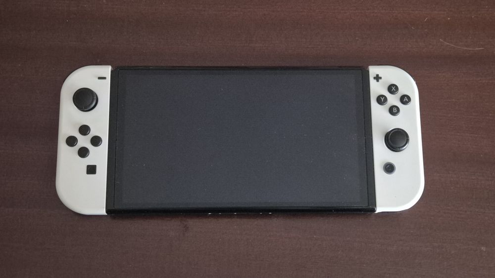 Nintendo Switch [OLED] + 1 Jogo [Pokémon Shining Pearl OU Zelda Tears of the Kingdom]
