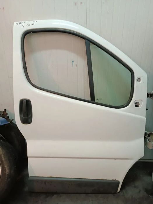 PORTA RENAULT TRAFIC II / OPEL VIVARO / PRIMASTAR - FRENTE ESQUERDA /