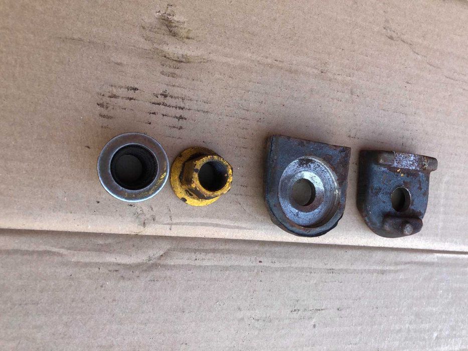 Прижим колеса екскаватора 100102006