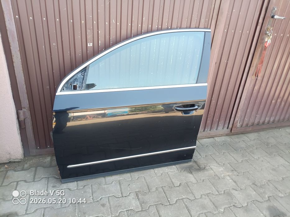 " Passat B6 drzwi lewe przednie LC9X