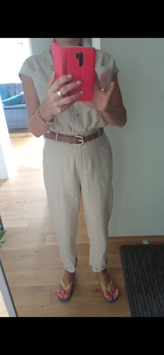 Kombinezon w kolorze beżu rozm. M/L