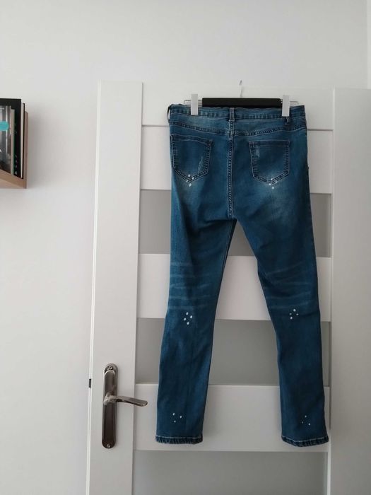 Jeansy przecierane damskie