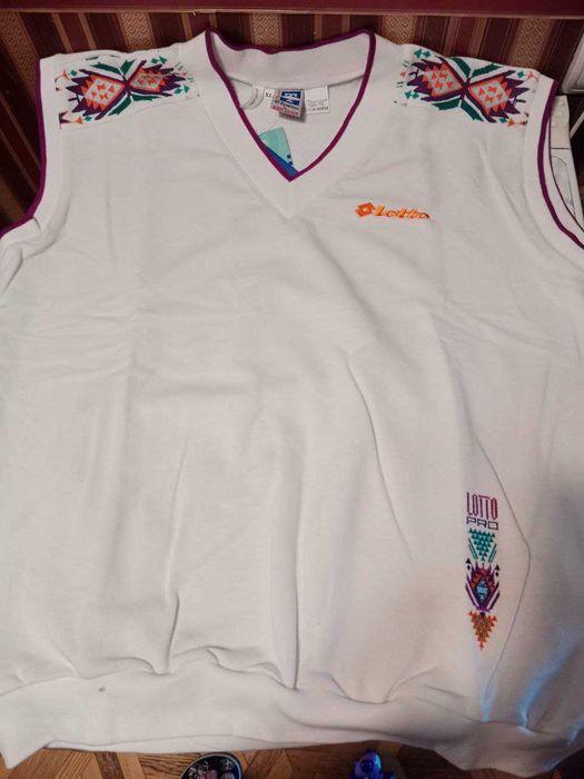 Мужской джемпер-безрукавка фирмы "Lotto". Новый.