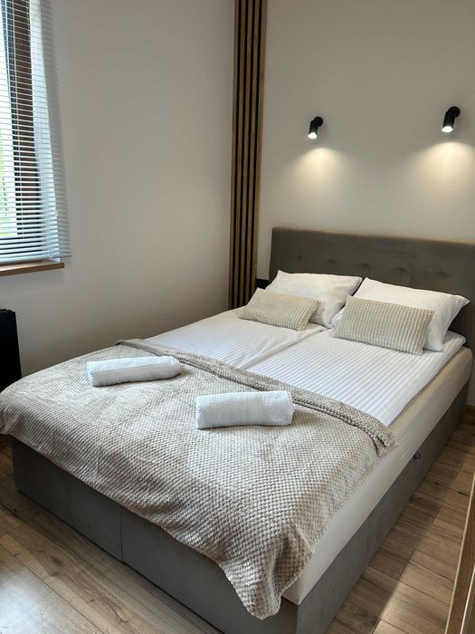 Pod Brzozami-domki całoroczne Balia jacuzzi noclegi Bałtów